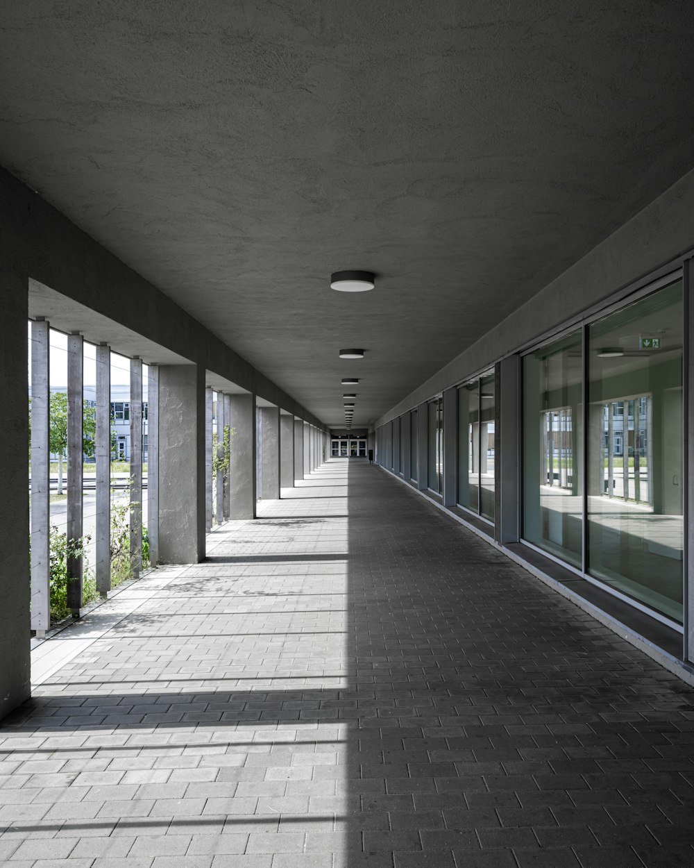 a long hallway with a clock on the wall