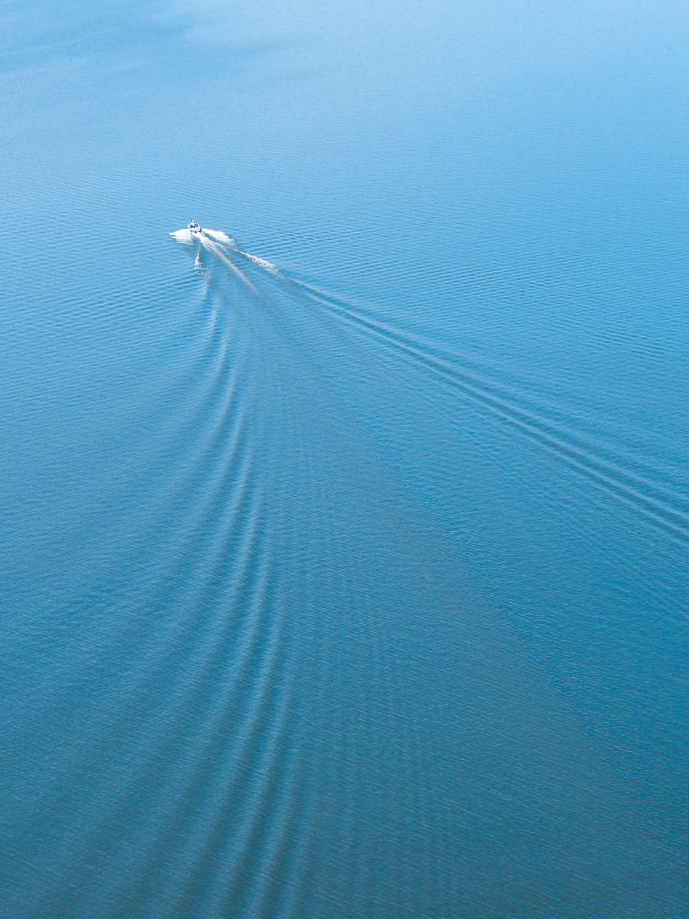 a boat is traveling across the water