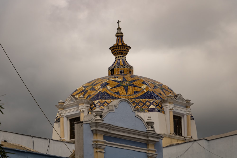 a dome with a cross on top of it