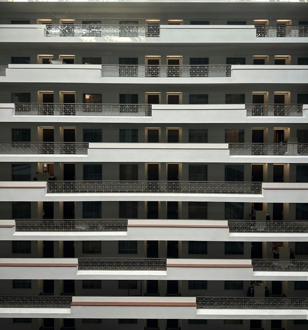 a tall building with balconies and balconies on each floor