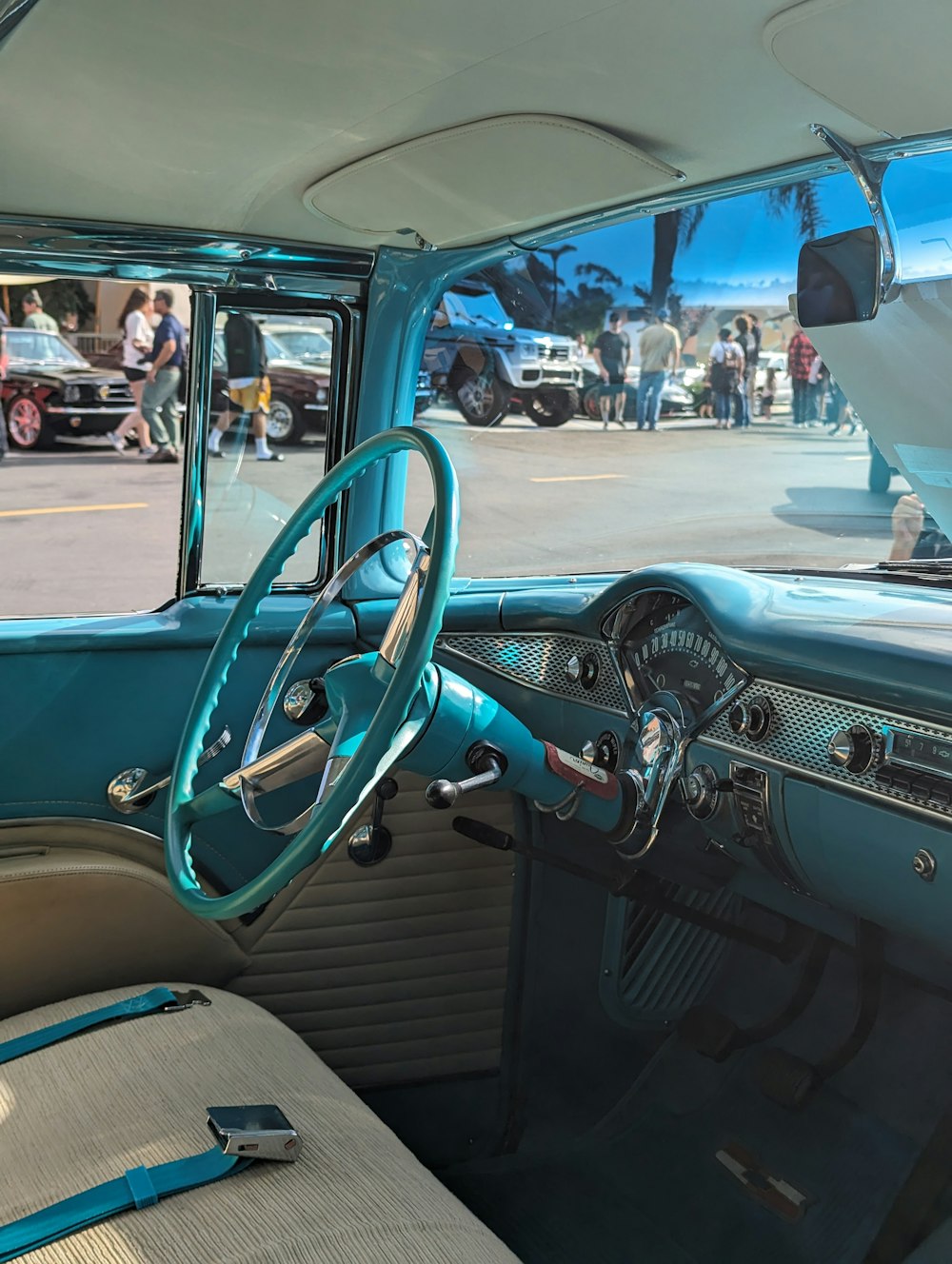 the interior of a car with a blue dash board