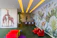 A vibrant nursery wall mural featuring whimsical clouds and playful animals in soft pastel tones.