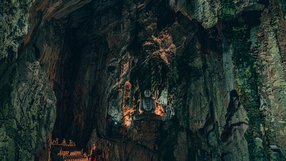 a group of people standing in a cave