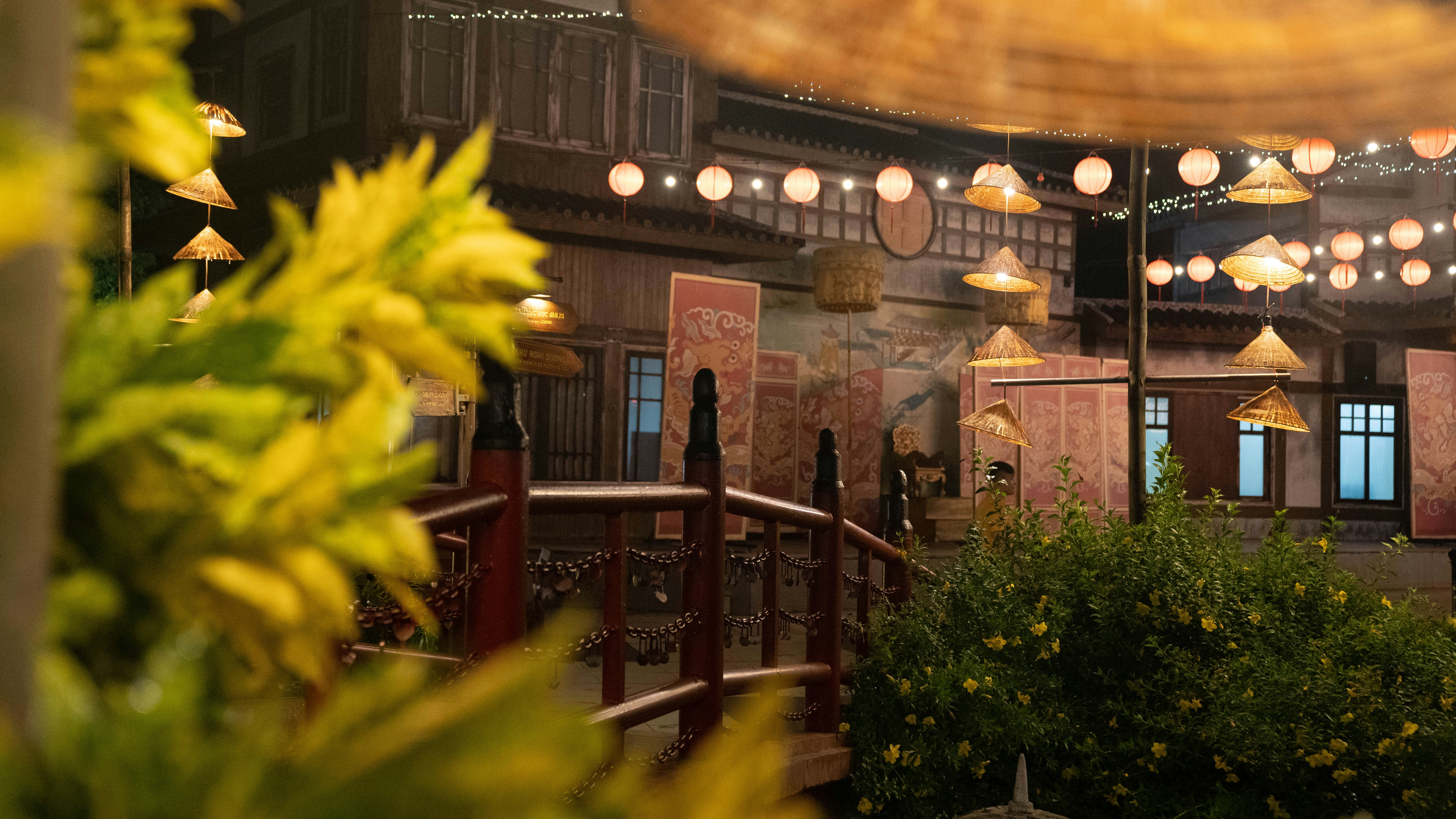 a room with a lot of lights hanging from the ceiling