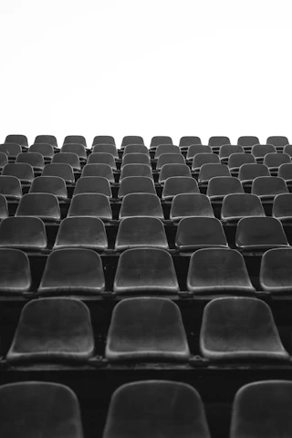 A serene view of 1000 empty chairs arranged at Place du Trocadéro symbolizing absence and hope.