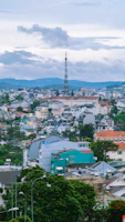 A vibrant cityscape with radio towers transmitting signals across Brazil.