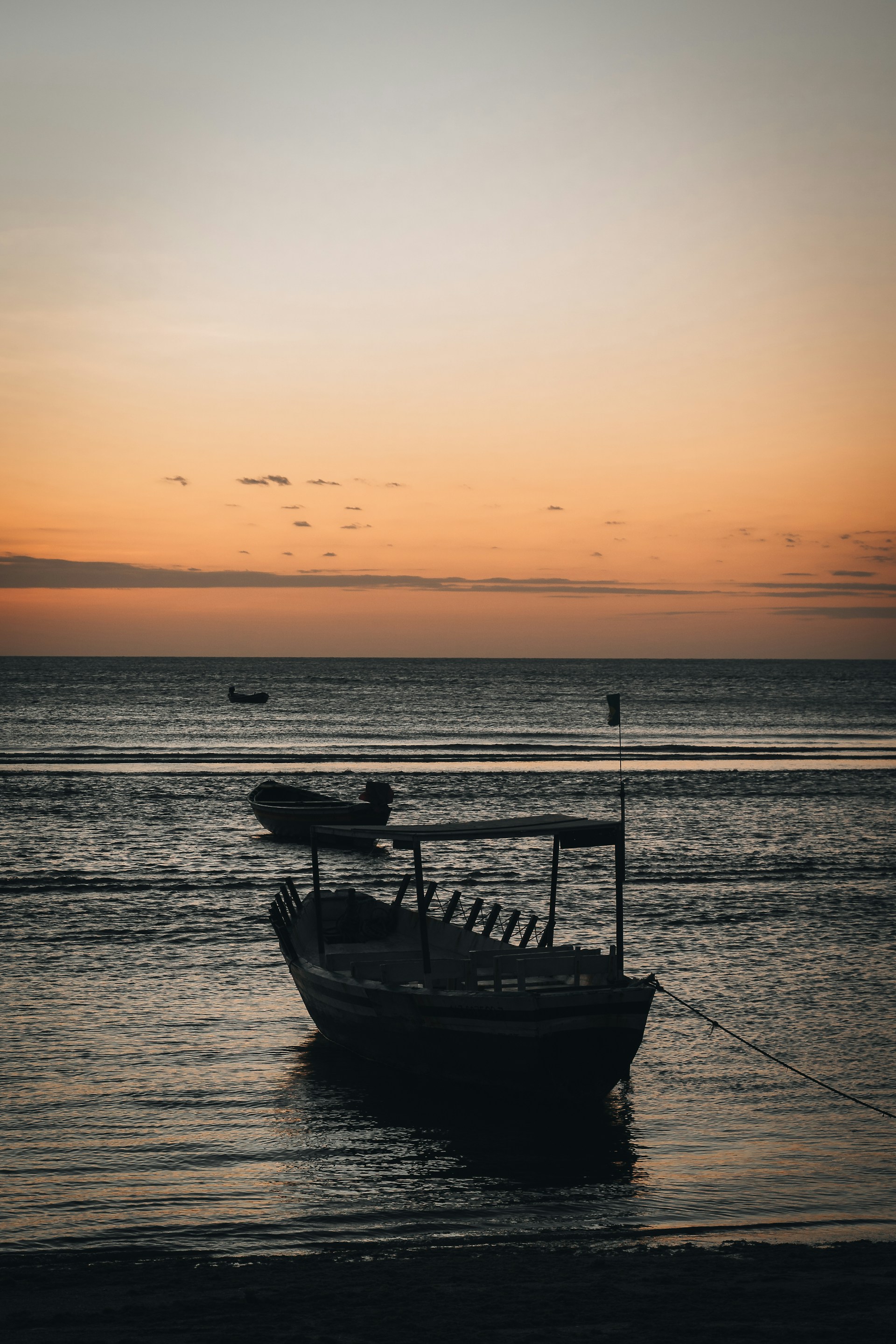 woman wearing yellow long-sleeved dress under white clouds and blue sky during daytime