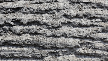 a close up view of a rock wall