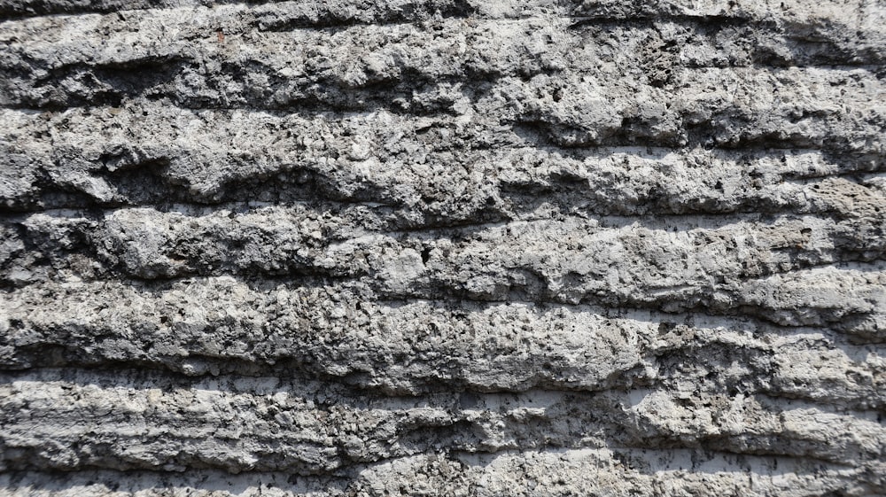 a close up view of a rock wall