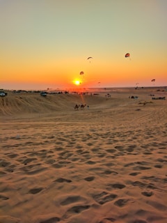 Tourists enjoying the serene waters of Huacachina oasis at sunset