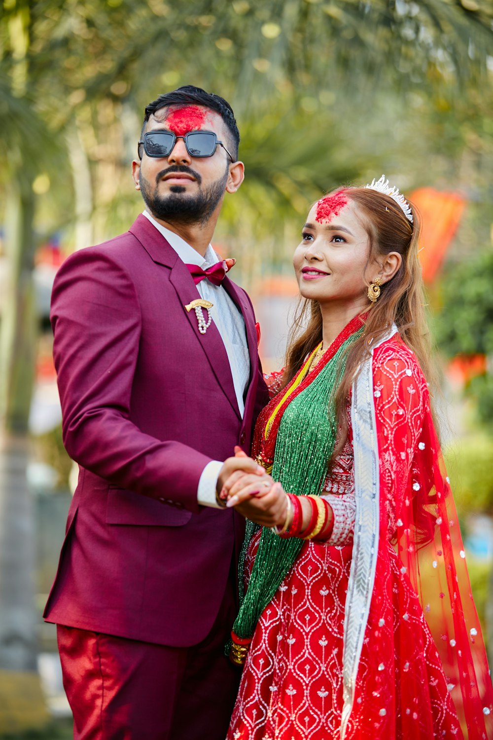 a man and a woman dressed in indian garb