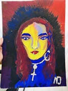 A vibrant portrait painting of a woman with bright yellow skin, blue eyes and lips, and red hair. The background has a gradient of dark brown, blue, and red. The woman is adorned with a large hoop earring in one ear and a necklace featuring a cross and a round pendant. The painting includes bold brush strokes and vivid colors.