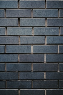 Industrial warehouse walls constructed with sturdy wirecut bricks.