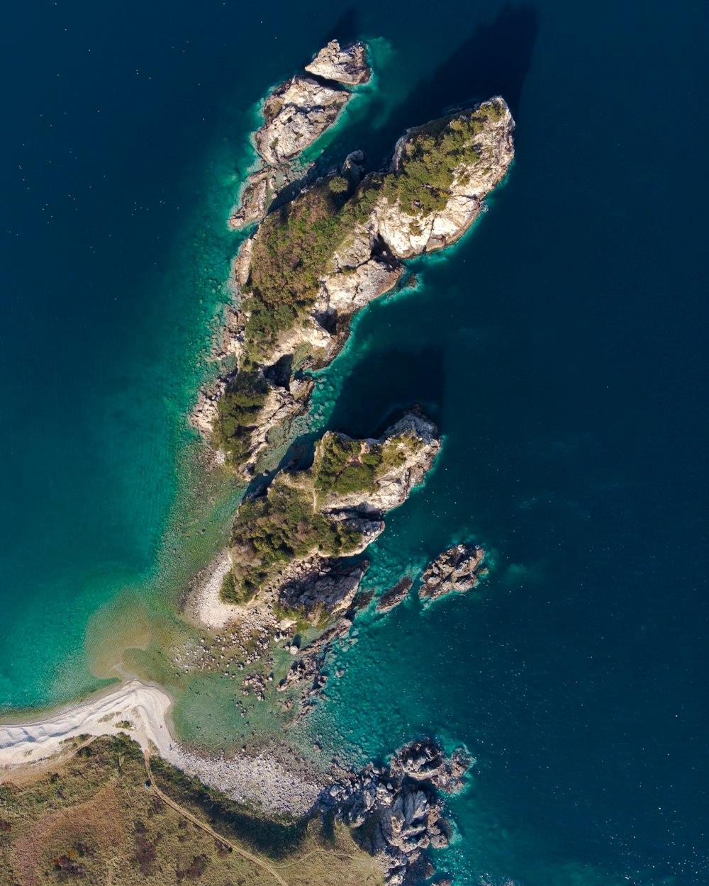 an aerial view of an island in the ocean