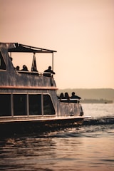 Boat transporting guests between Agatti Island and 4h lakshadweep resort at sunrise.