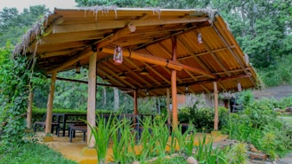 Cozy gazebo spots where guests relax and enjoy local snacks from the kantin.