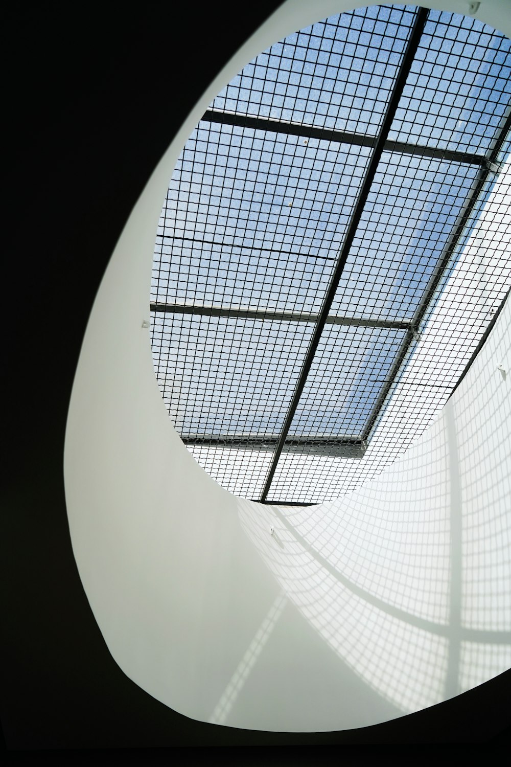 a round window with a skylight above it