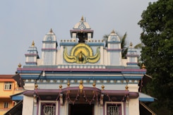 a building with a clock on the top of it