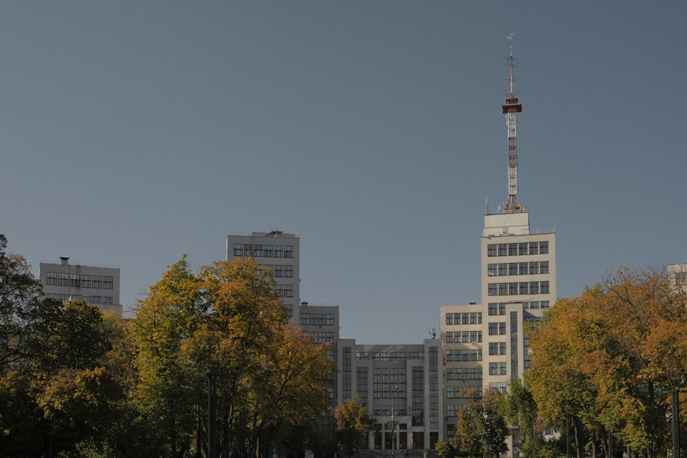 a tall building with a crane on top of it