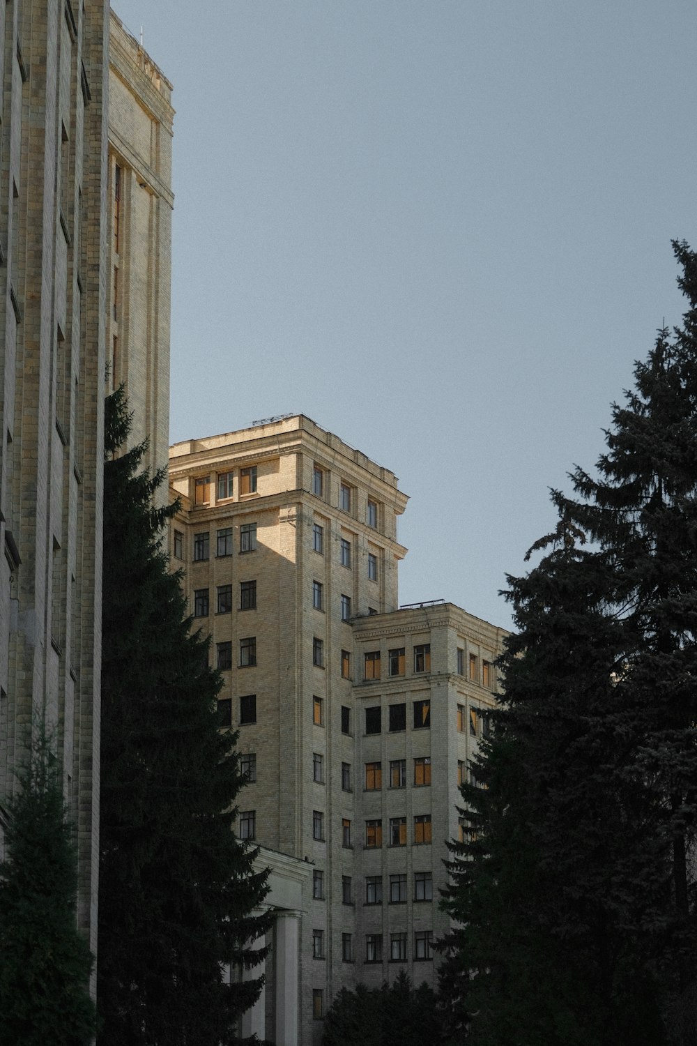 a tall building with a clock on the front of it