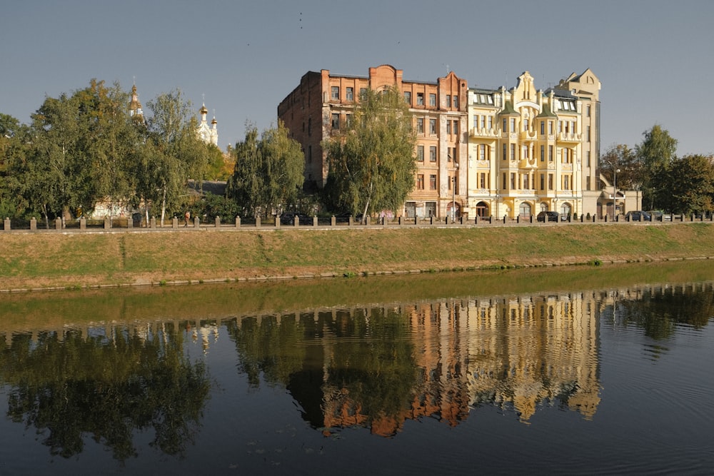 a large building next to a body of water