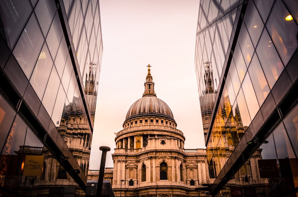 a view of the dome of st paul's cathedral through the windows of a