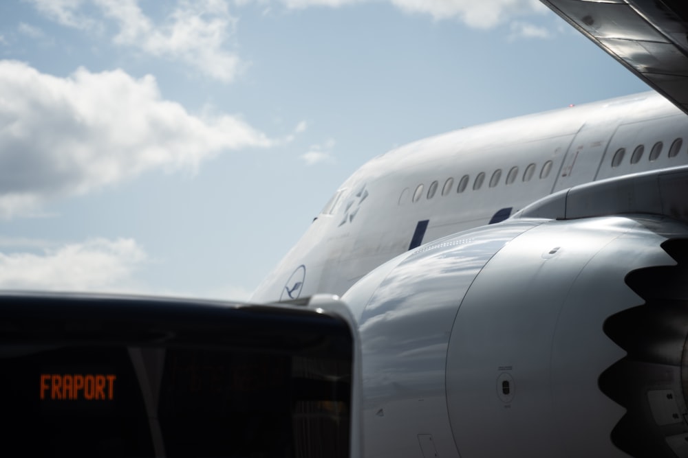 a large jetliner sitting on top of an airport tarmac