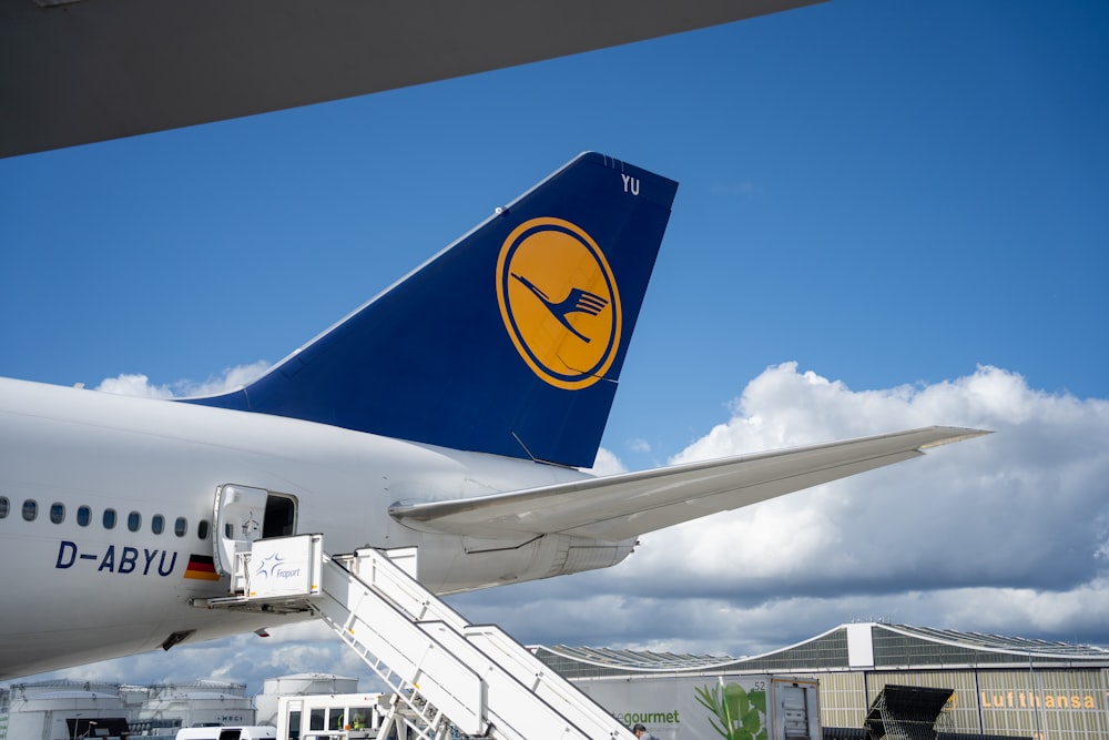 a large jetliner sitting on top of an airport tarmac