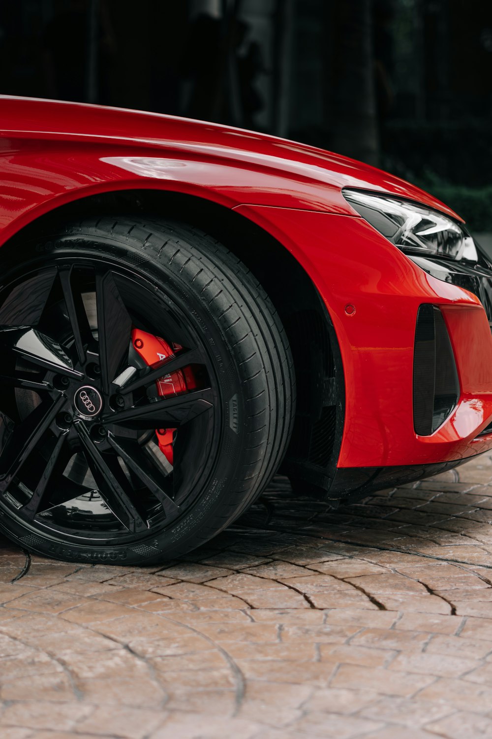 a close up of a red sports car