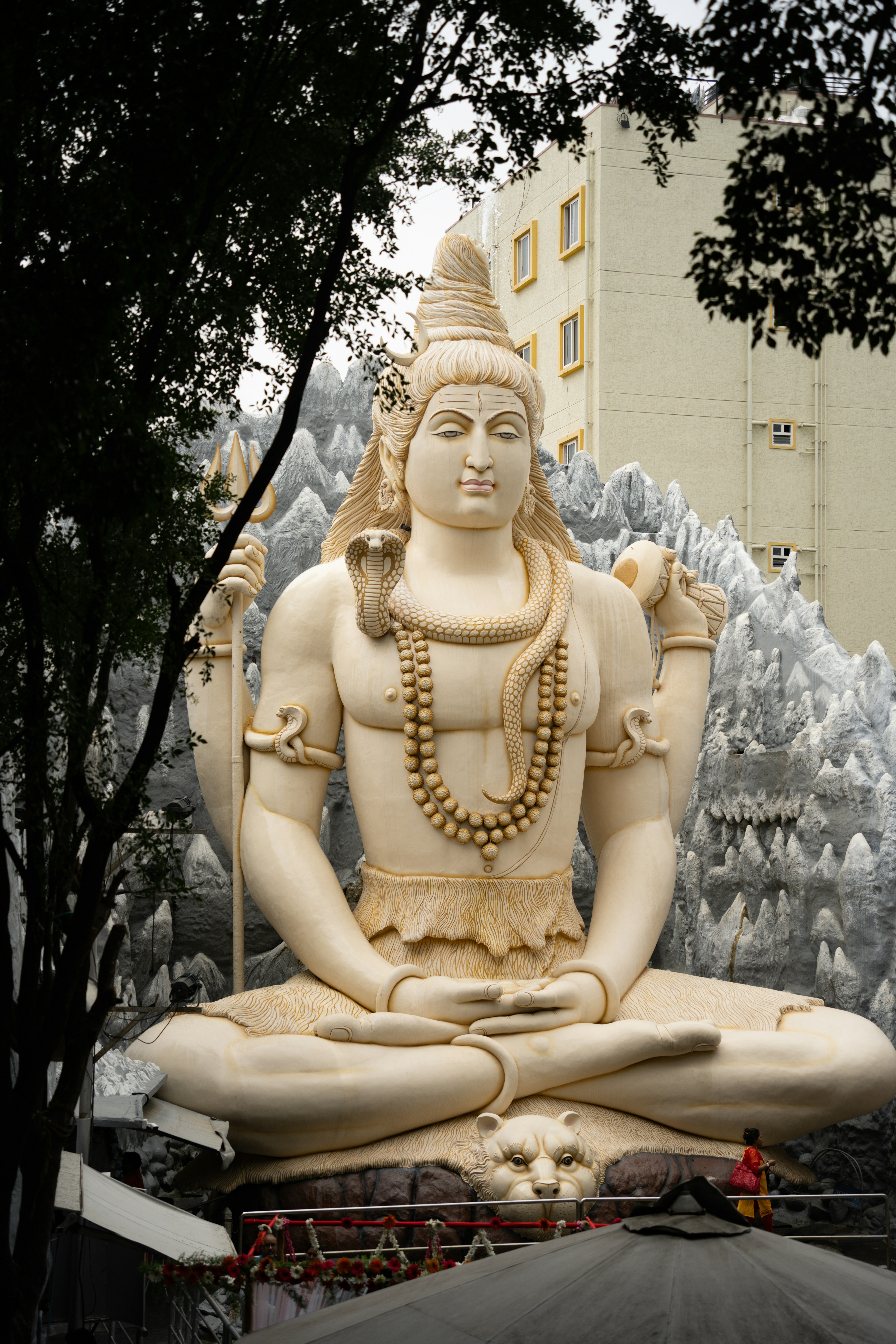 a statue of a person sitting in a lotus position