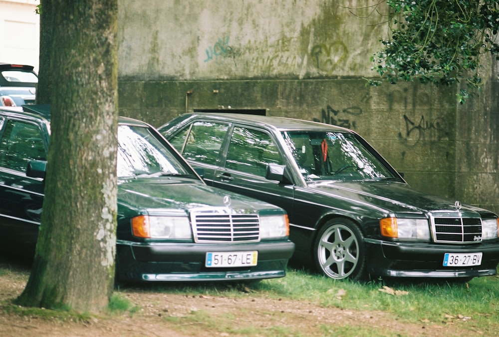 a couple of cars parked next to each other