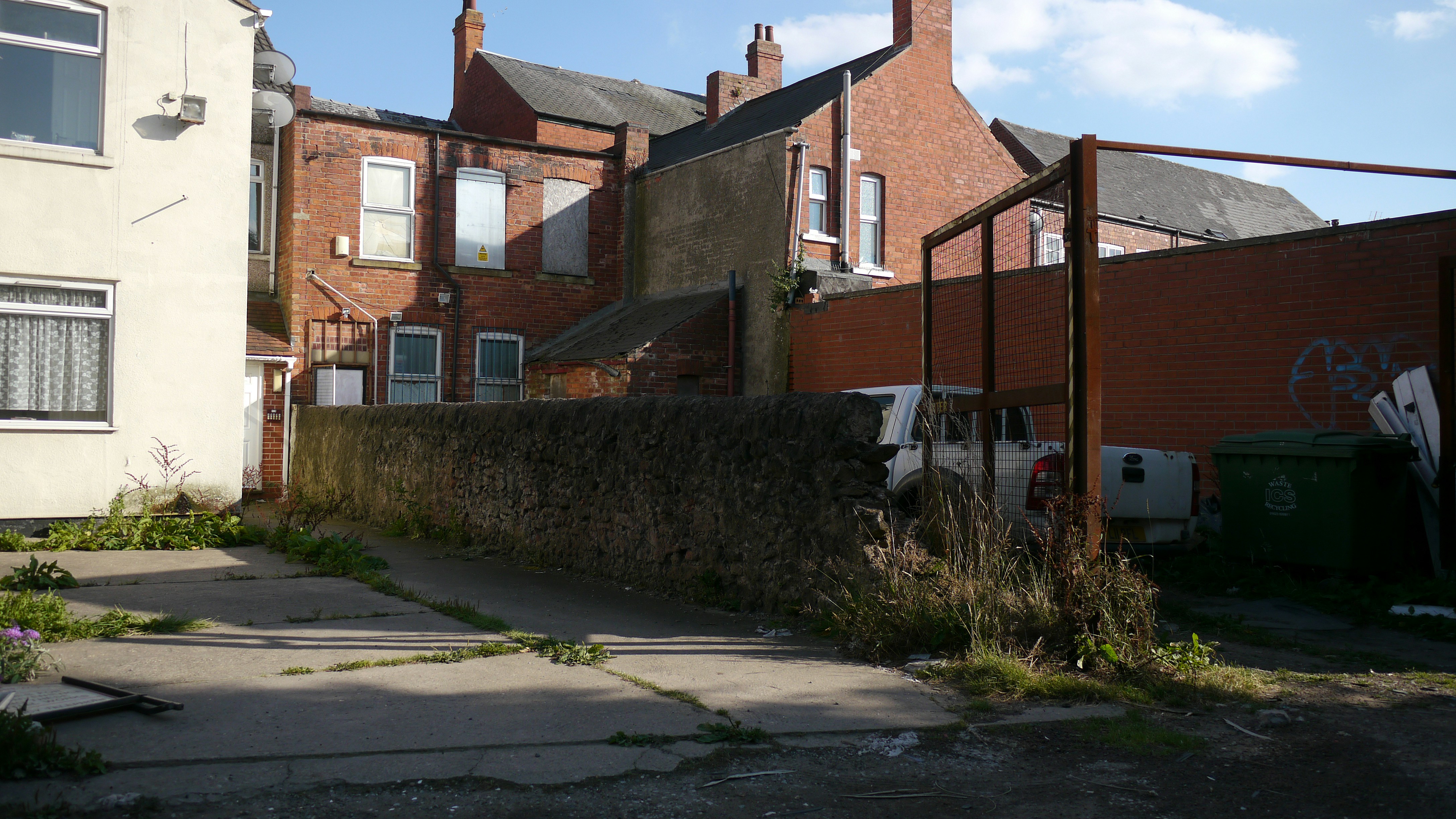 The back alley and the building of whatever the owners need.