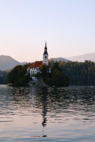 A picturesque view of the Kärdla Baptist Church surrounded by nature.