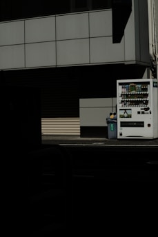 A sleek vending machine being installed in a modern Brisbane office space.
