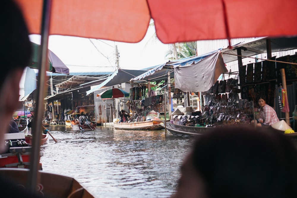 a person sitting on a boat in the water