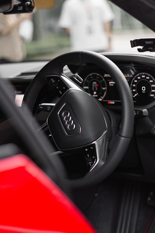 Close-up of a virtual cockpit display being activated in an Audi car.