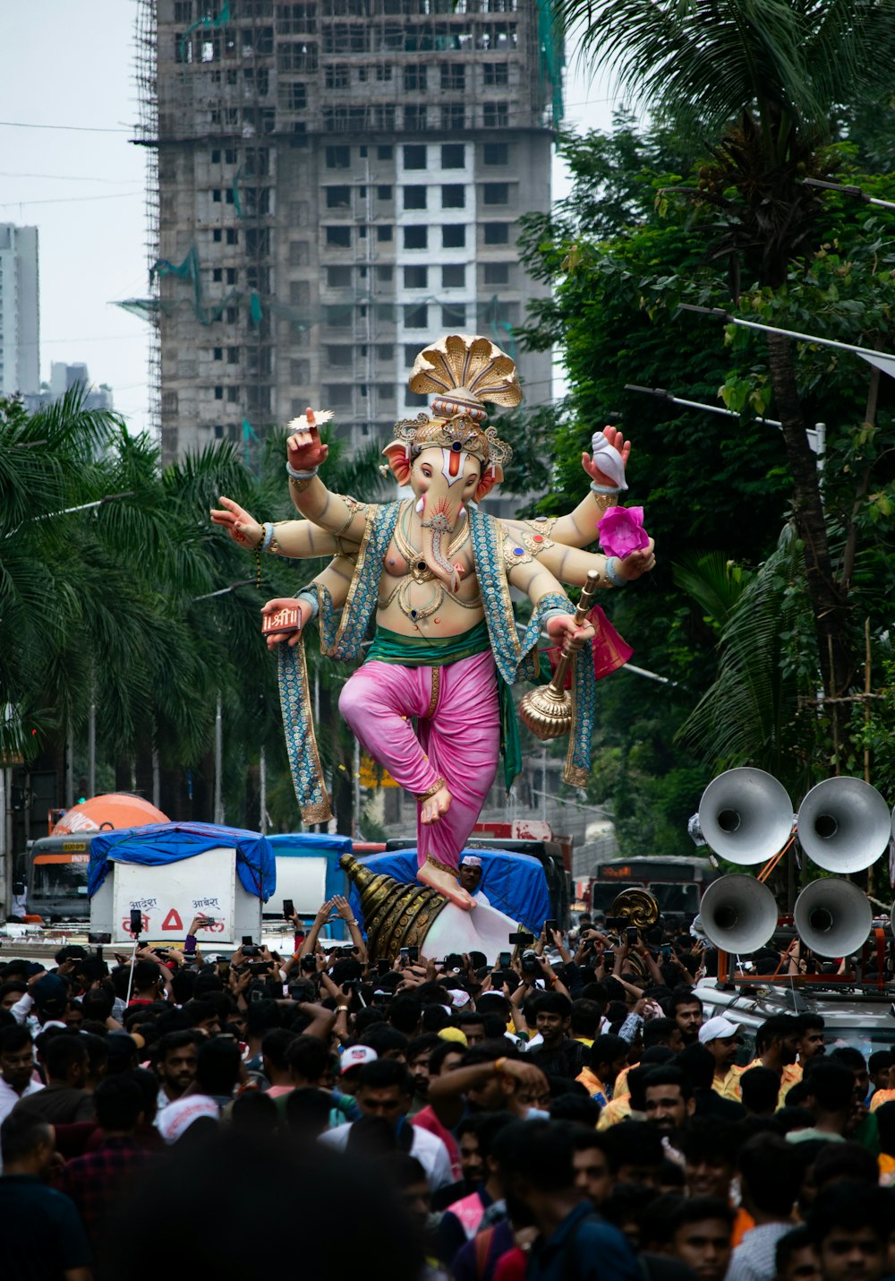 a large statue of a man riding on top of a float