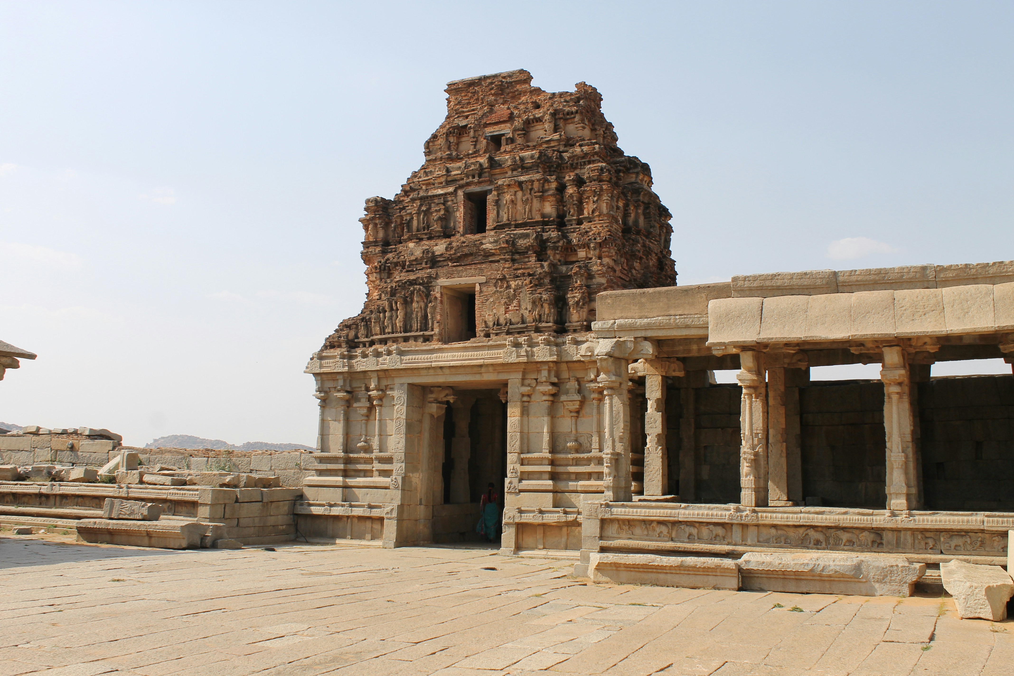 a large stone structure with steps leading up to it, 