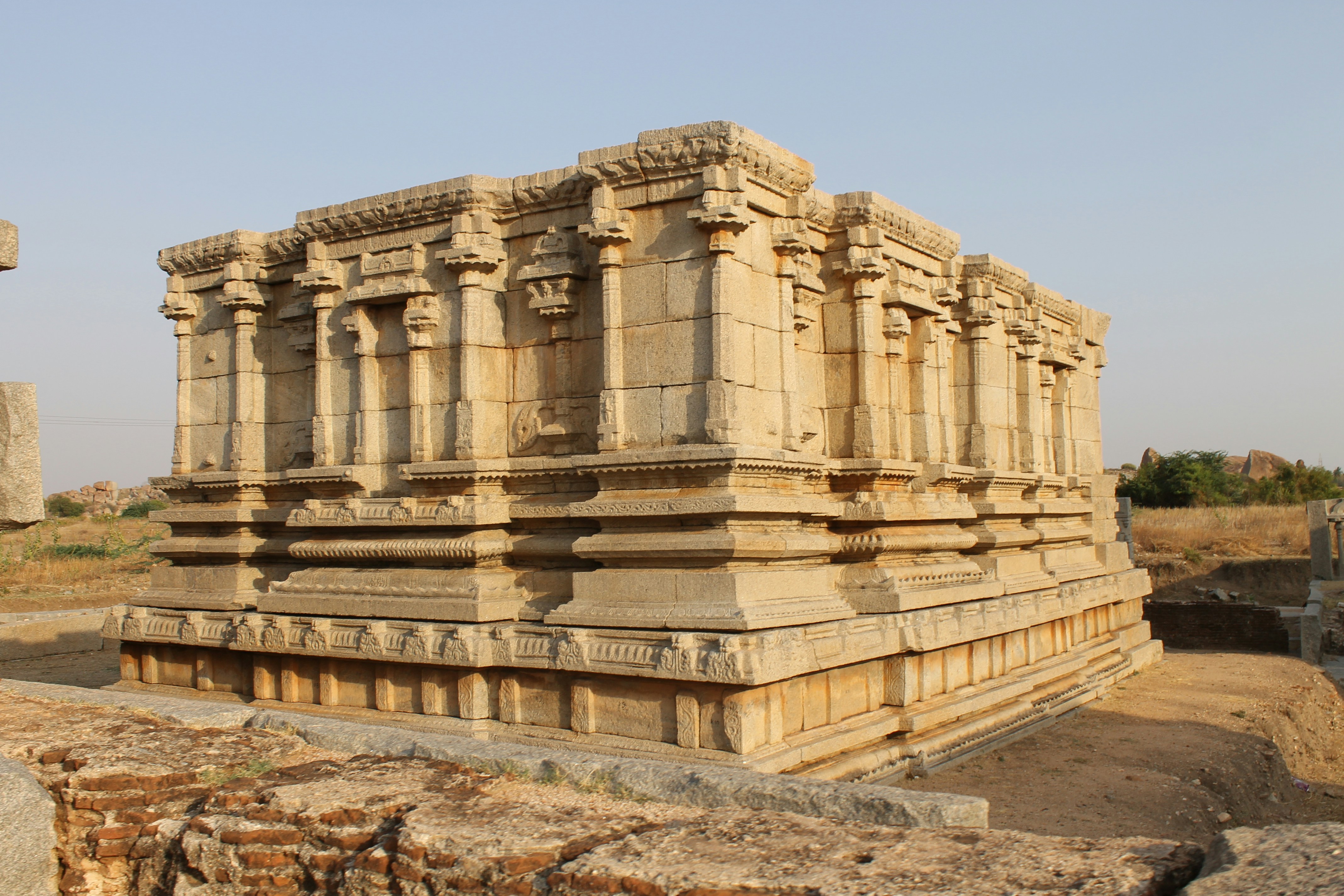 Large stone structure on dirt field