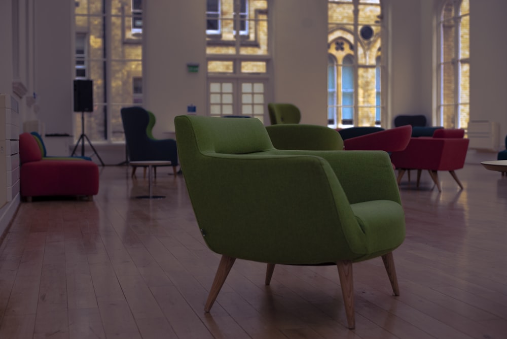 a room with a lot of chairs and a fire place