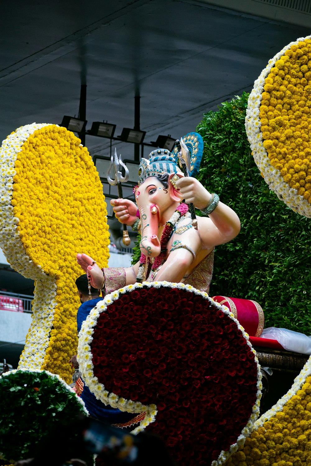 a man in a costume riding on top of a float