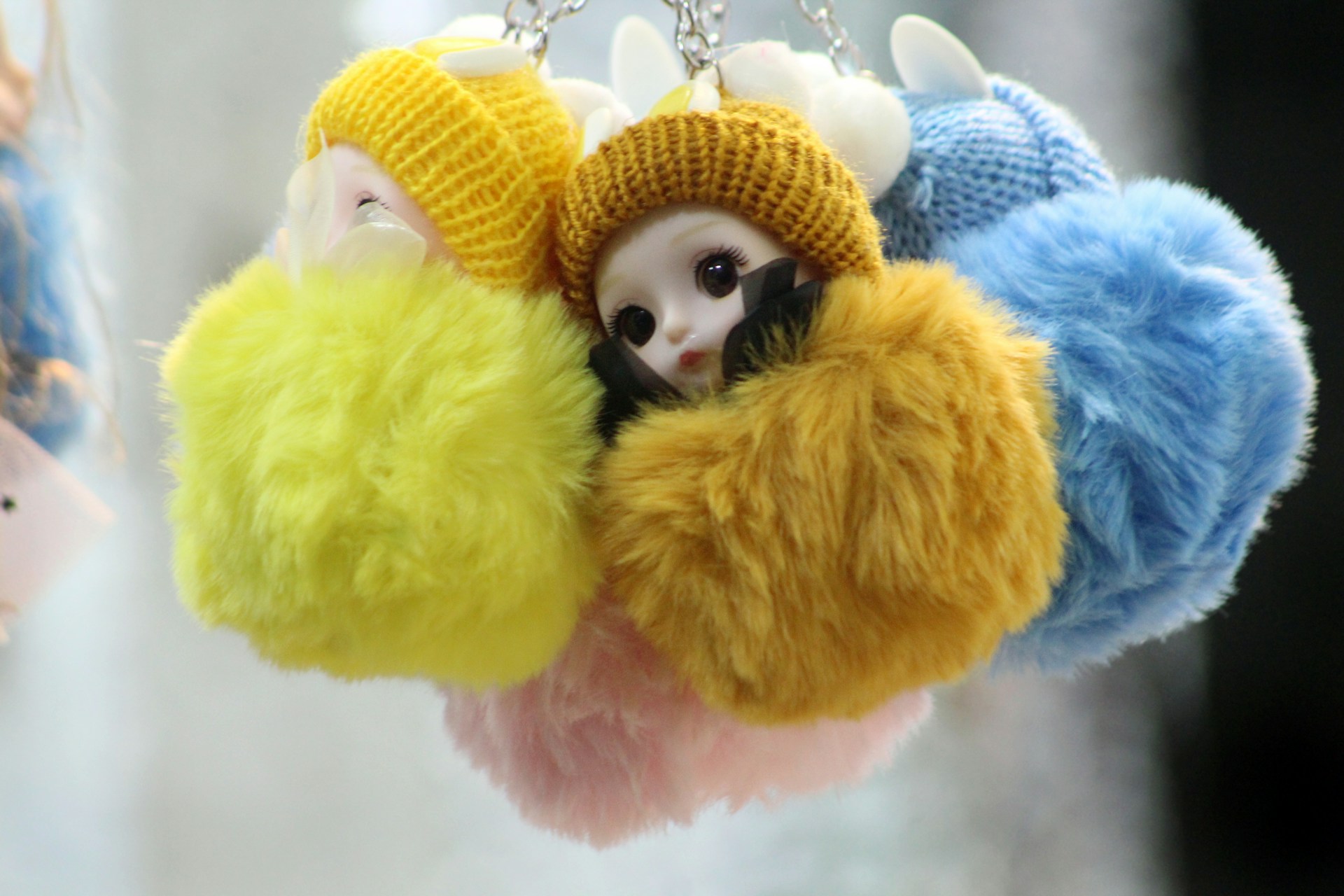 person wearing grey knit sweater