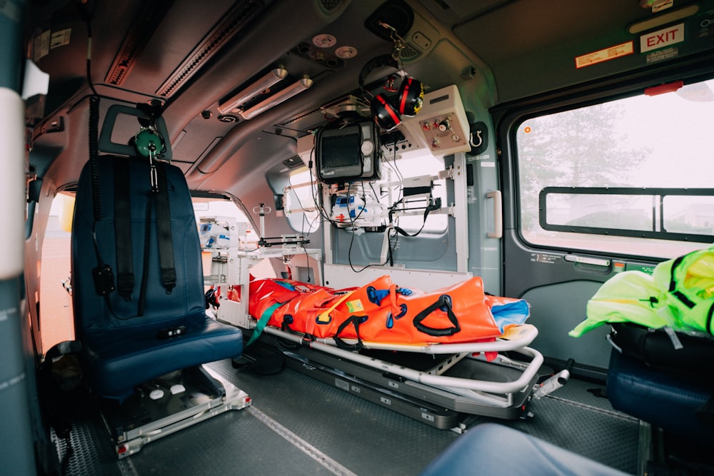 an ambulance with a stretcher attached to the back of it