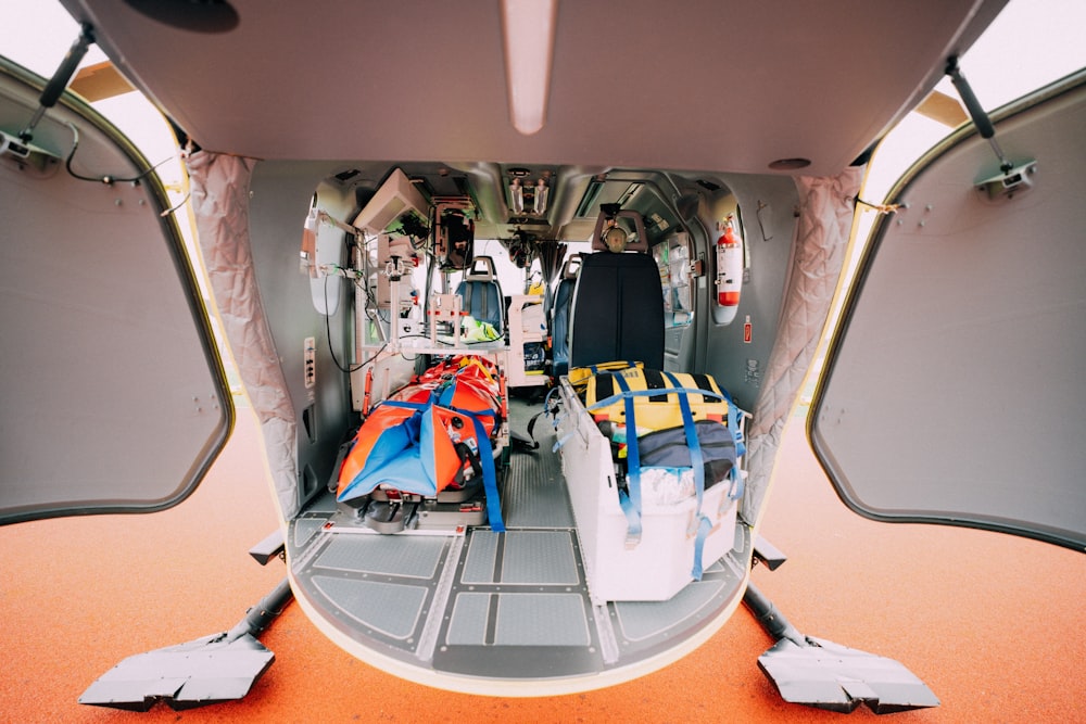 the inside of an airplane with the door open