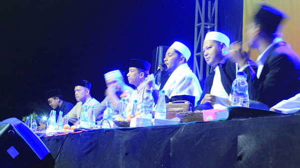 Elders gathered around a table verifying Somali oral histories.
