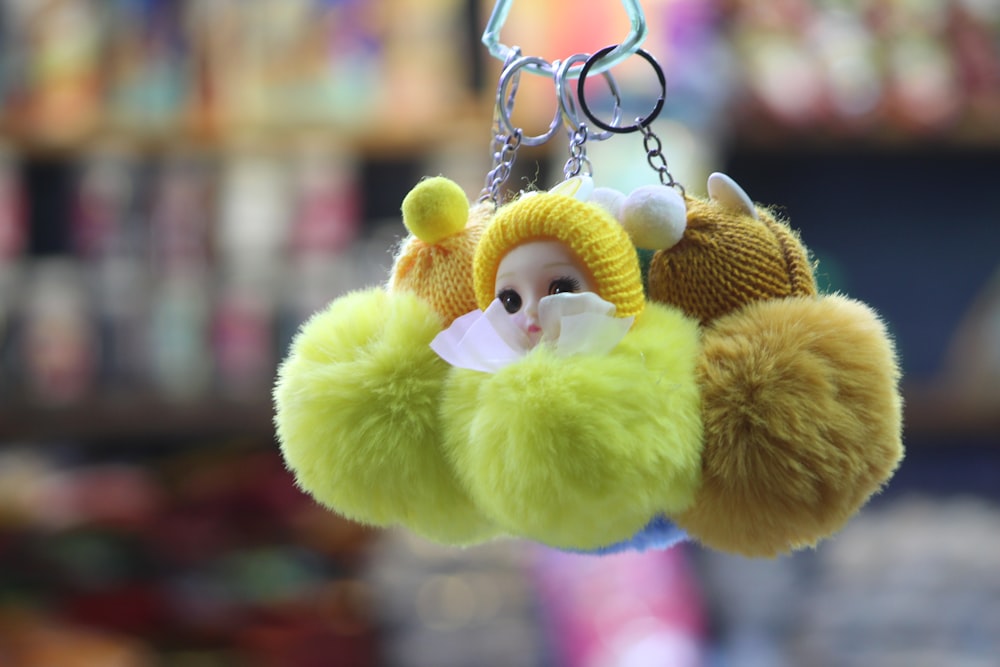 a stuffed animal hanging from a key chain