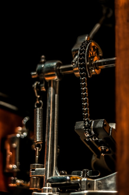 Close-up of a technician adjusting the spring mechanism inside a garage door