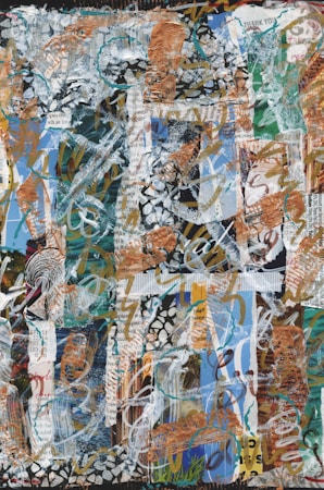 A vibrant abstract collage composed of mixed media elements, including layers of text, paint, and various textures. The composition features a mix of swirling patterns and bold brushstrokes, with parts of printed text appearing through the layers. The color scheme includes earthy tones with blues and greens, along with metallic accents.
