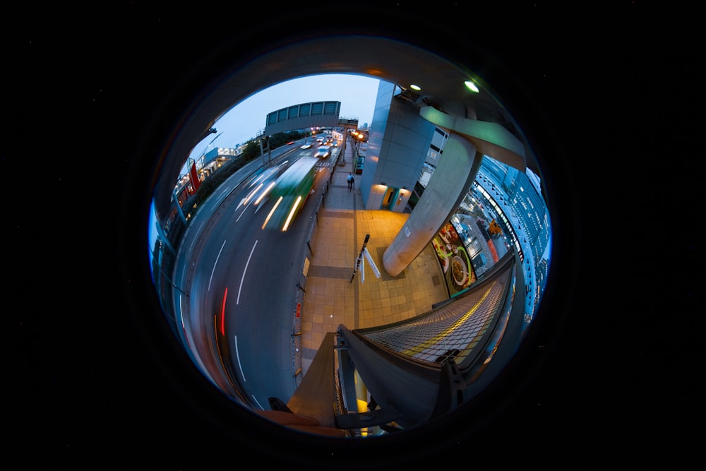 a fish eye view of a city street at night