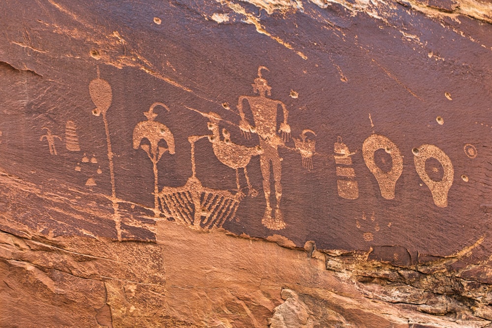 a rock with some drawings on it